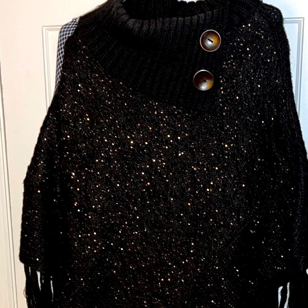 Beautiful black w/ gold sequins shawl. Perfect paired with leggings & jeans!NWOT